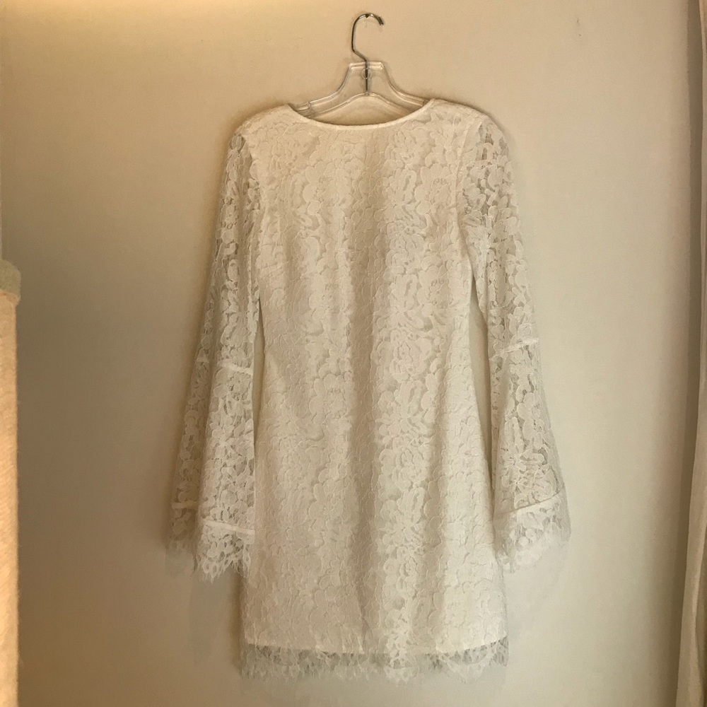 White lace dress with bell sleeves